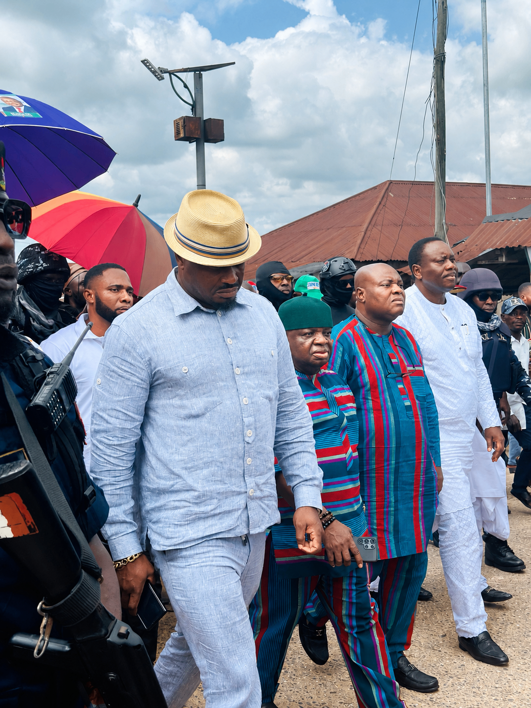 John Ifere walking with religious and community leaders
